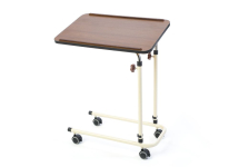 Walnut overbed table with castors